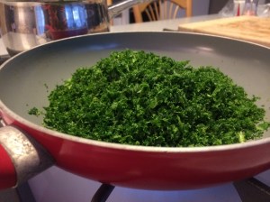 Finely chopped kale in saucepan